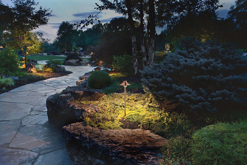 path lighting next to a stone pathway