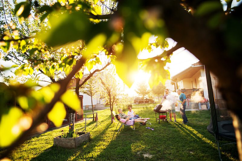 family enjoying backyard in houston